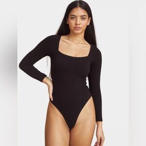 NWT Klassy Network Black Long Sleeve Bodysuit